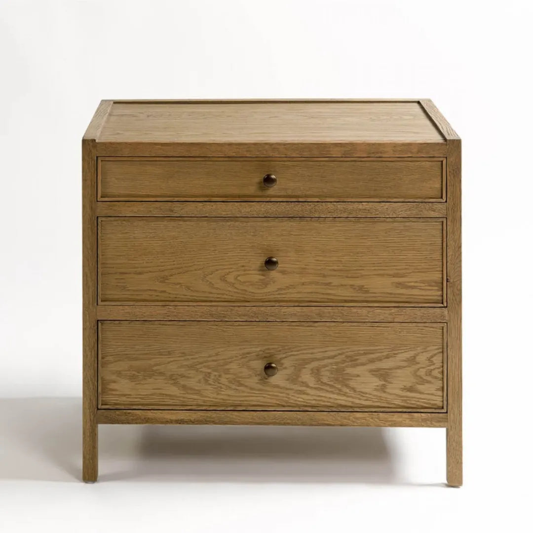 modern wooden nightstand with three drawers and bronze knobs